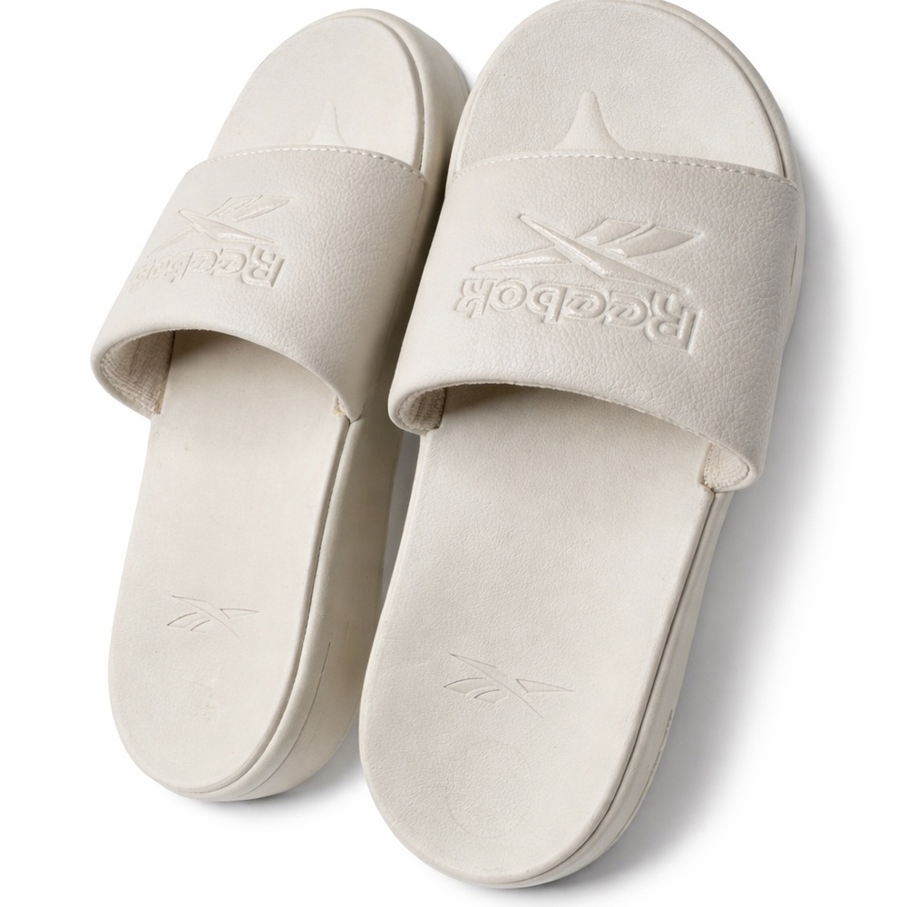 new beige Reebok flip-flops size 8